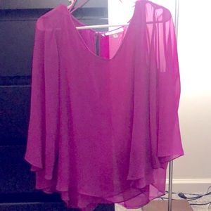 Jennifer Lopez purple blouse